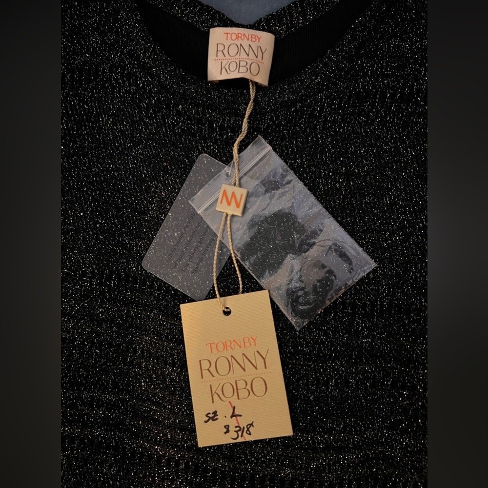 Torn by Ronny KoBo with tags size large could fit like a medium